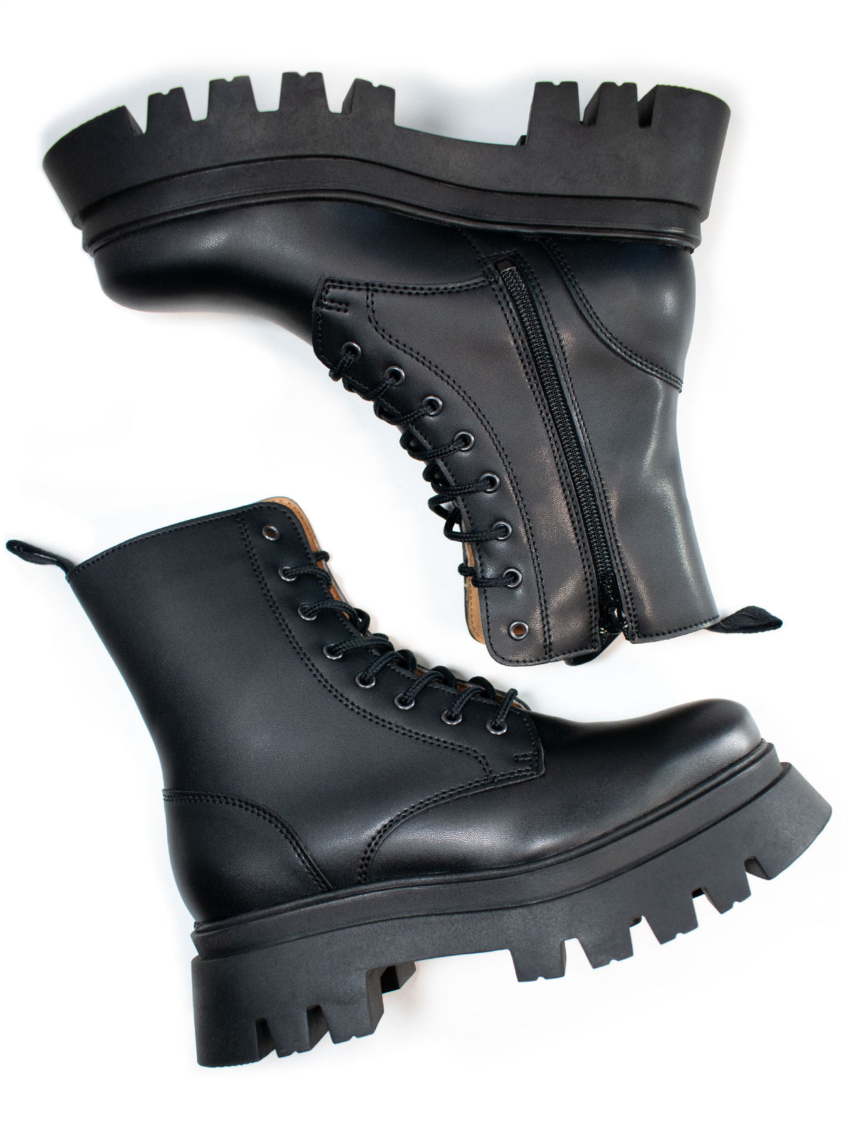 Track Sole 8-Eye Lace Up Boots in Black