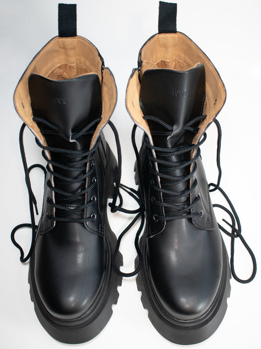 Track Sole 8-Eye Lace Up Boots in Black